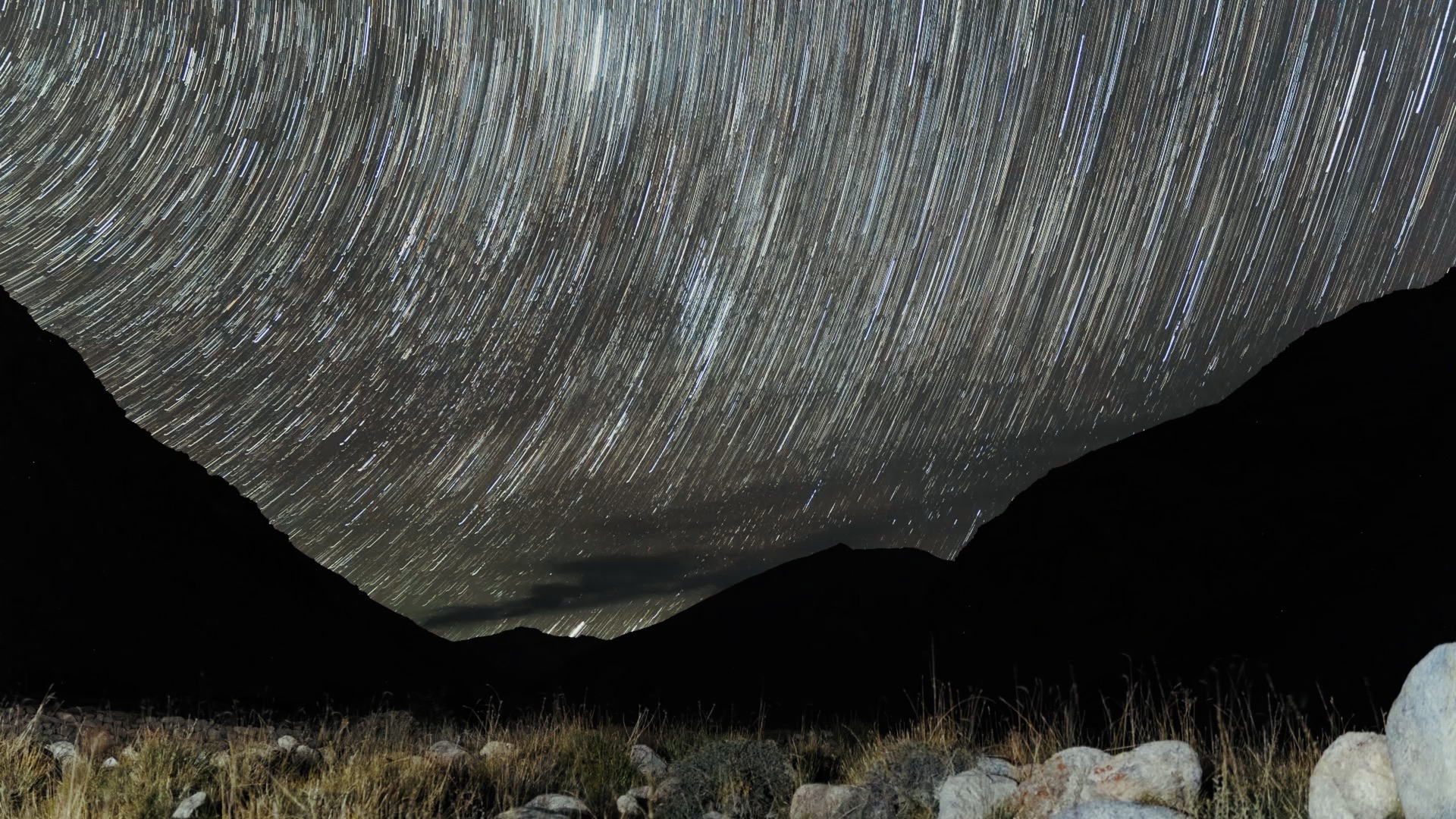 Long-exposure star trails over Ladakhi mountains at night