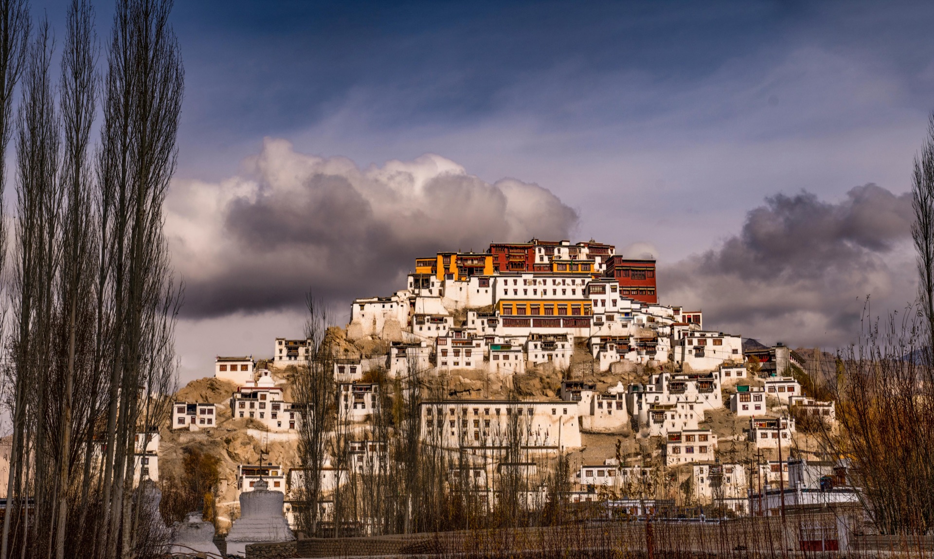 Thiksey Monastery under dramatic clouds